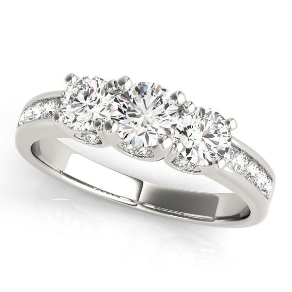 ENGAGEMENT RINGS 3 STONE ROUND