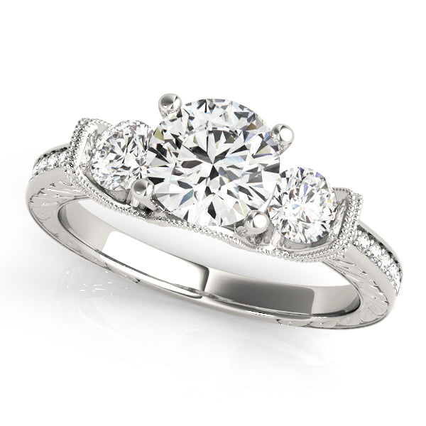 ENGAGEMENT RINGS 3 STONE ROUND